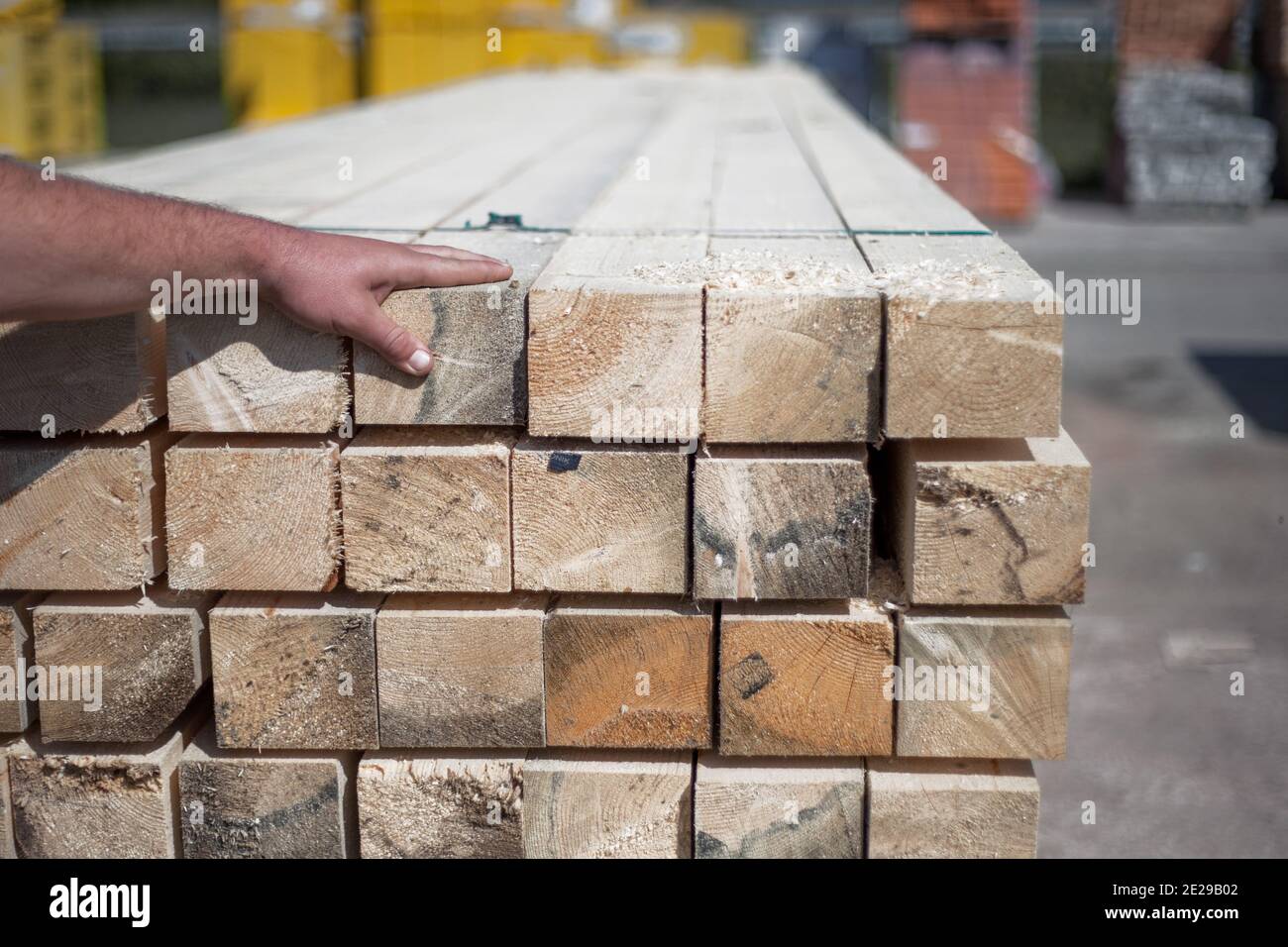 Stack of long wooden planks with sharp edges Stock Photo