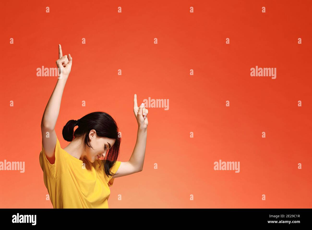 Funny dancing happy young woman Stock Photo - Alamy