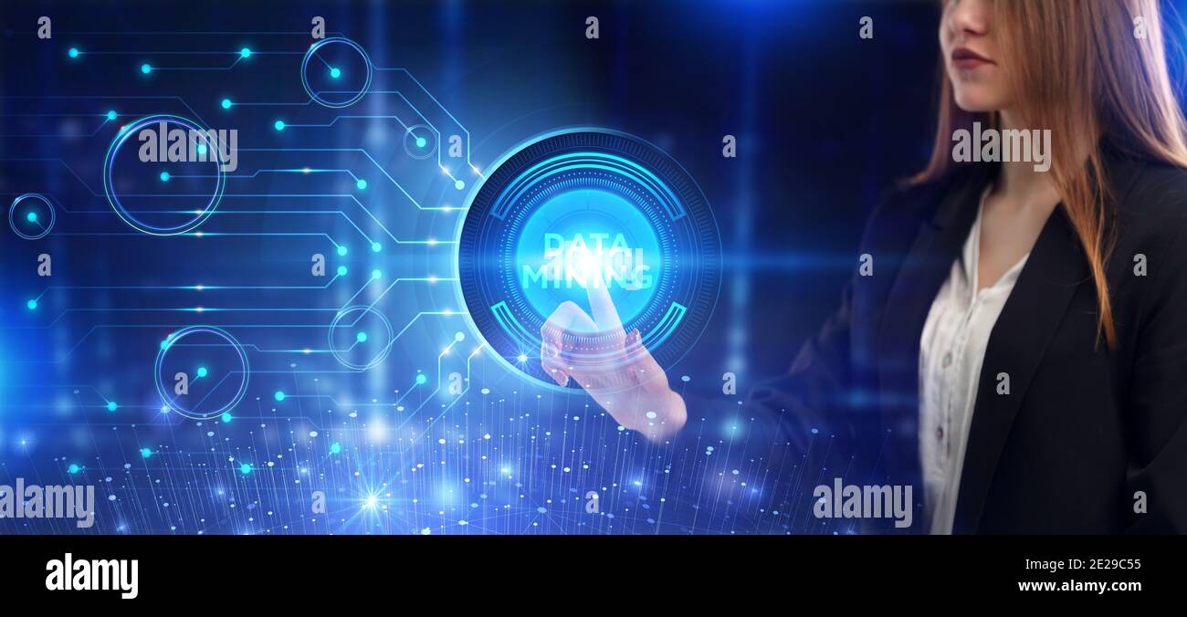 Business, Technology, Internet and network concept. Young businessman working on a virtual screen of the future and sees the inscription: Data mining Stock Photo