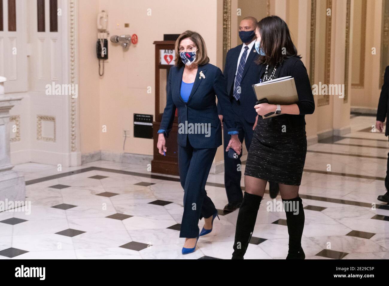 Washington DC- Speaker of the, United States. 12th Jan, 2021. House of  Representatives Nancy Pelosi walks from the House Chamber after holding  votes on the removal of President Trump form office. Photo