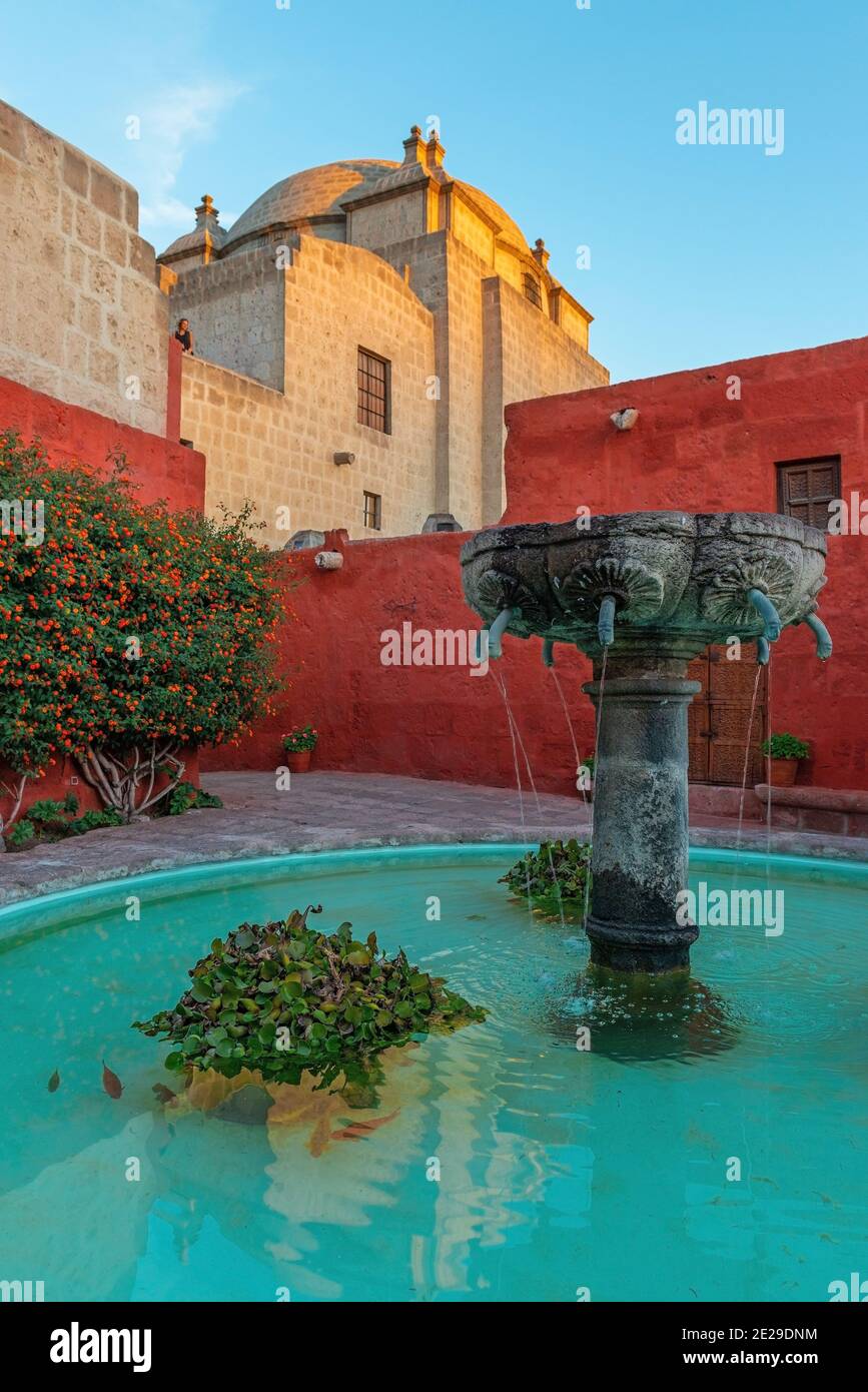 Fountain in the Santa Catalina convent at sunset, Arequipa, Peru. Focus on fountain. Stock Photo