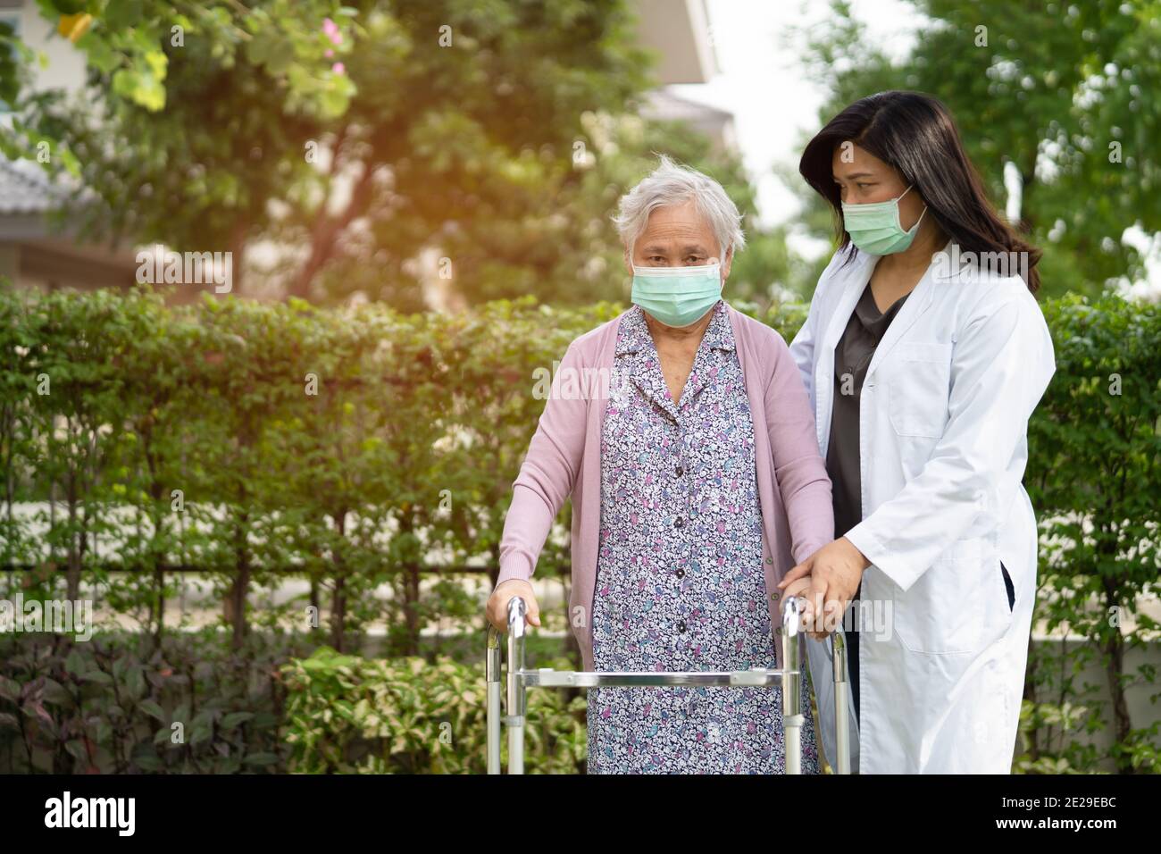 Rollator elderly face mask hi-res stock photography and images - Alamy