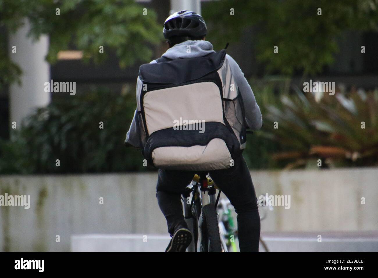 A food delivery rider in Sydney, NSW, Australia Stock Photo Alamy