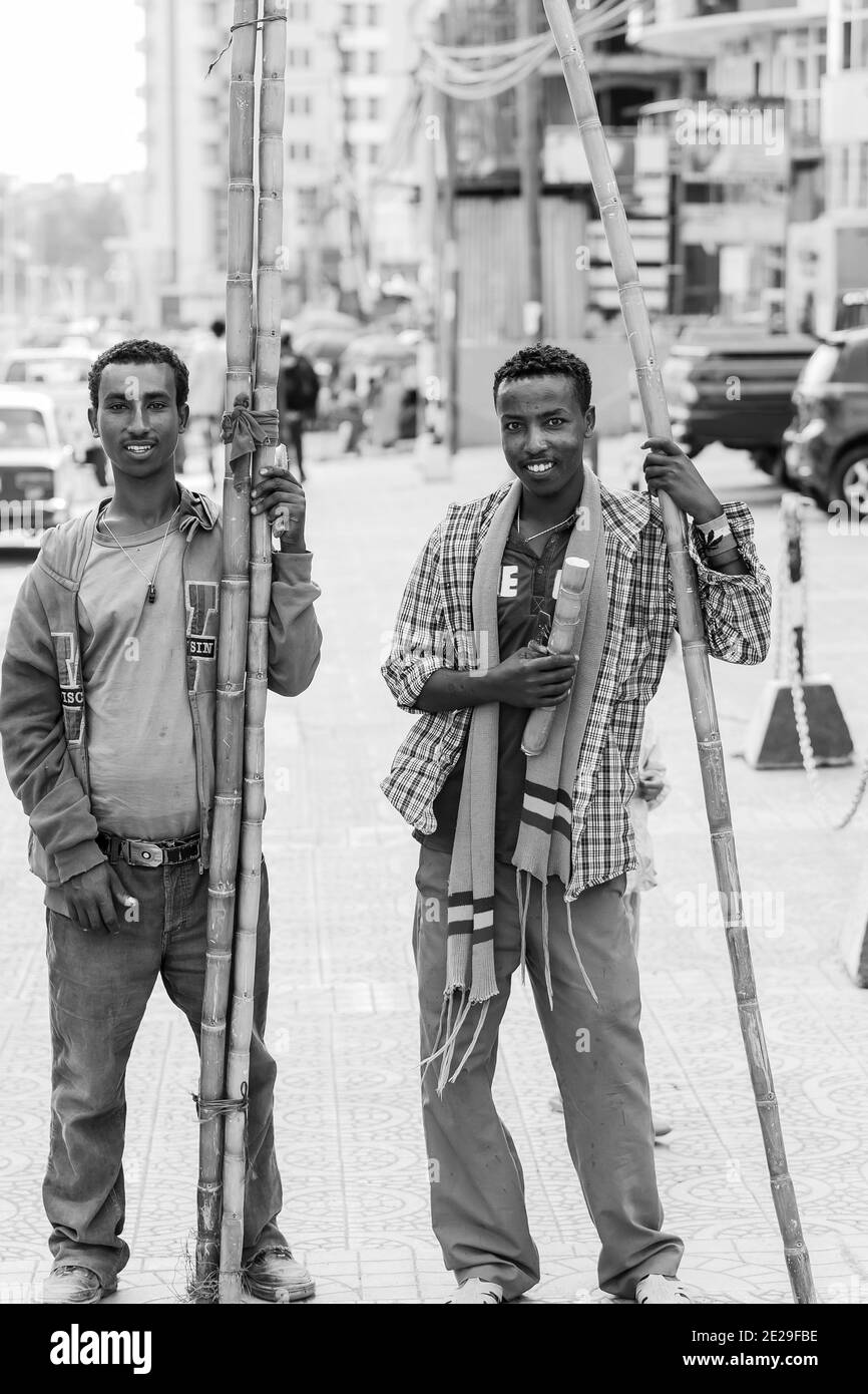 ADDIS ABABA, ETHIOPIA - Jan 05, 2021: Addis Ababa, Ethiopia, January 27, 2014, Men selling sugarcane on the street Stock Photo