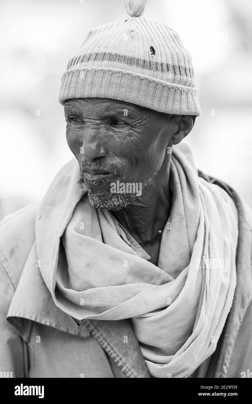 ADDIS ABABA, ETHIOPIA - Jan 05, 2021: Addis Ababa, Ethiopia, January 27, 2014, Old African man with a green hat Stock Photo