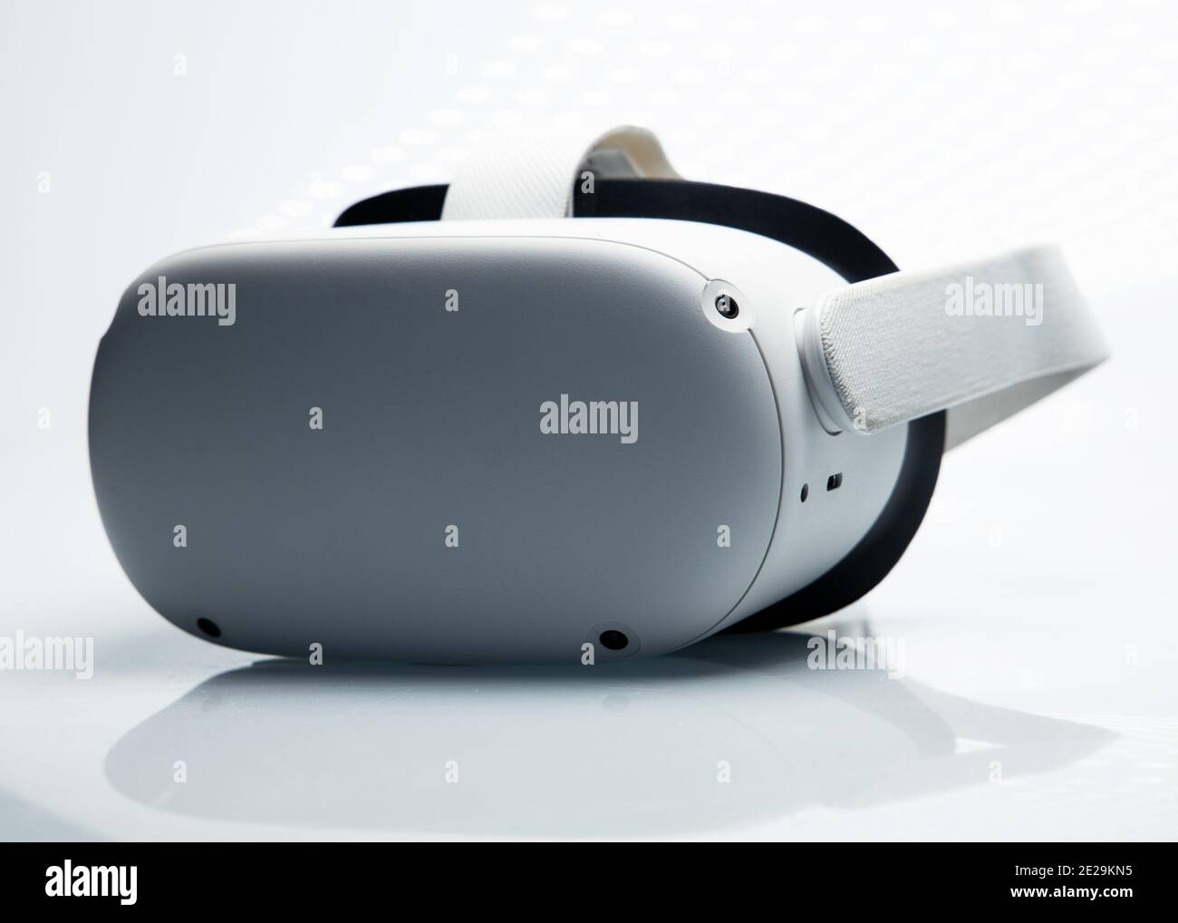 White new generation VR headset isolated on white background with sparkling  futuristic lights. Oculus Quest 2 virtual reality headset Stock Photo -  Alamy