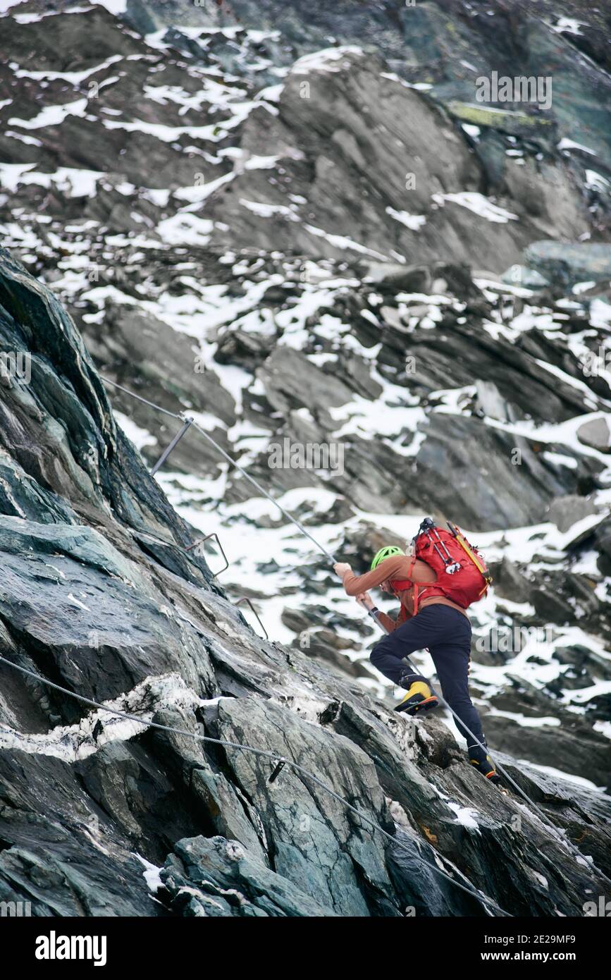 Climbing alpinist hi-res stock photography and images - Alamy