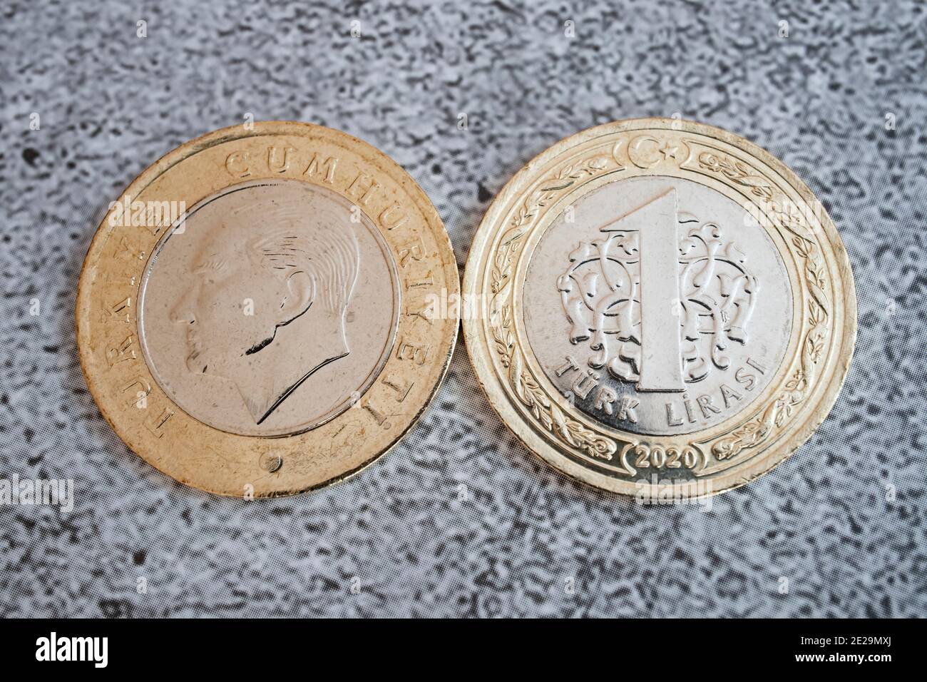 Close up Turkish one lira coins on grey background Stock Photo - Alamy