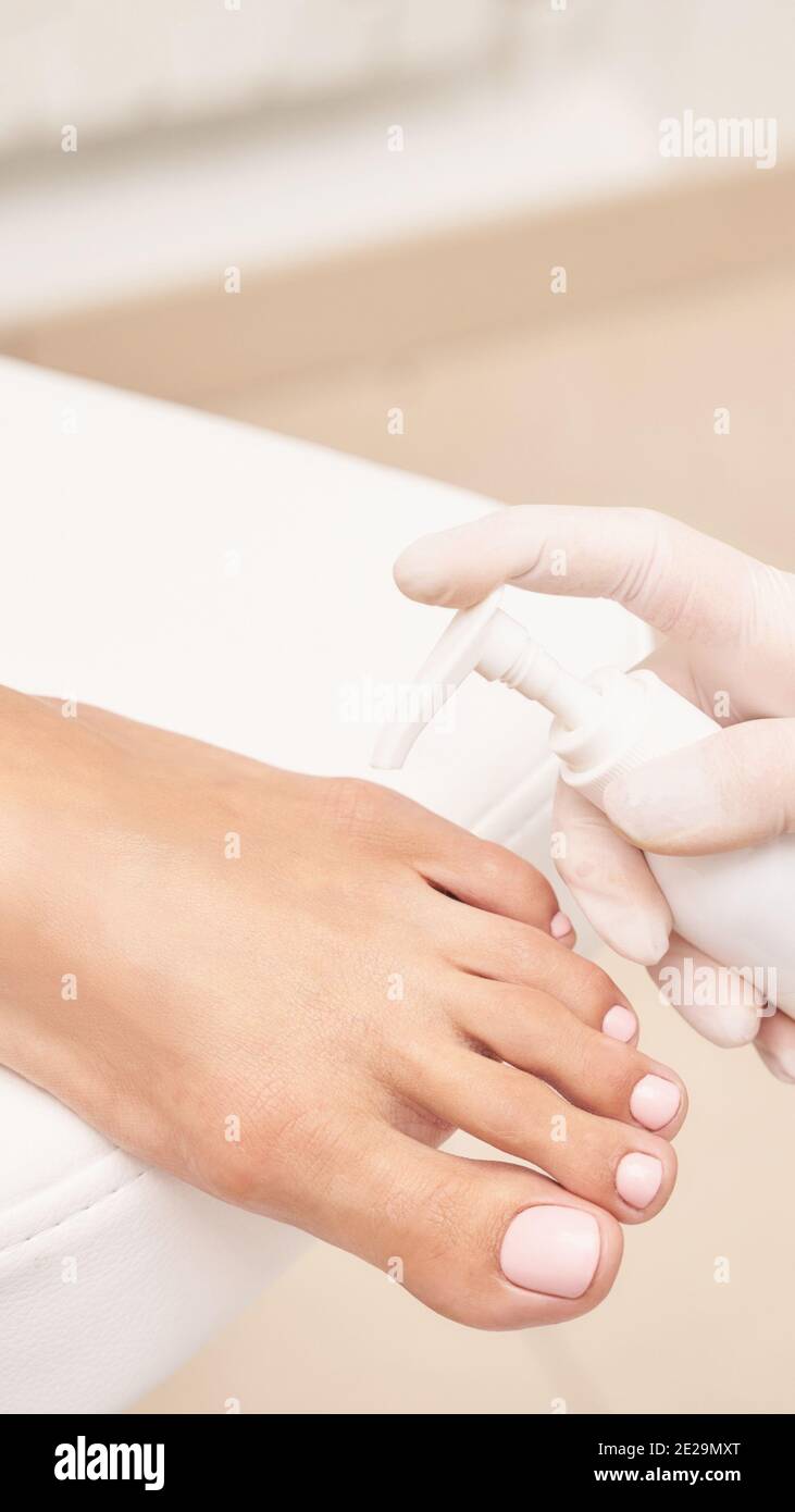 Pedicure nail spa procedure. Foot manicure. Salon master. Polish woman leg Stock Photo Alamy