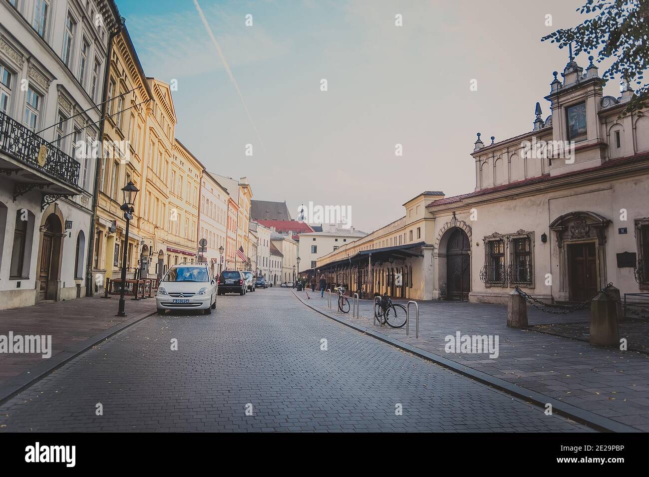 Street with historical houses in Krakow old town, Poland Stock Photo