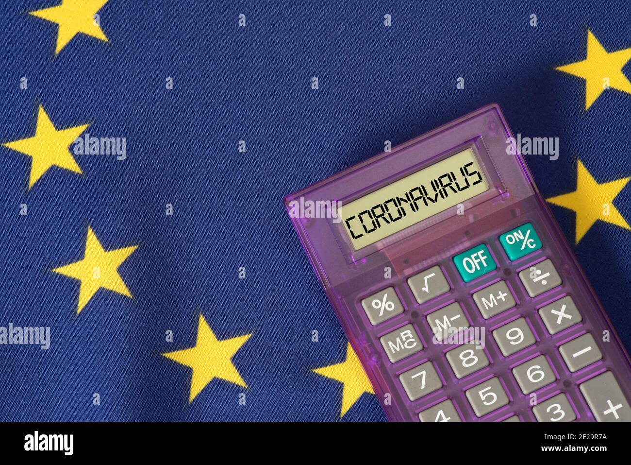 Flag of EU, calculator and coronavirus Stock Photo