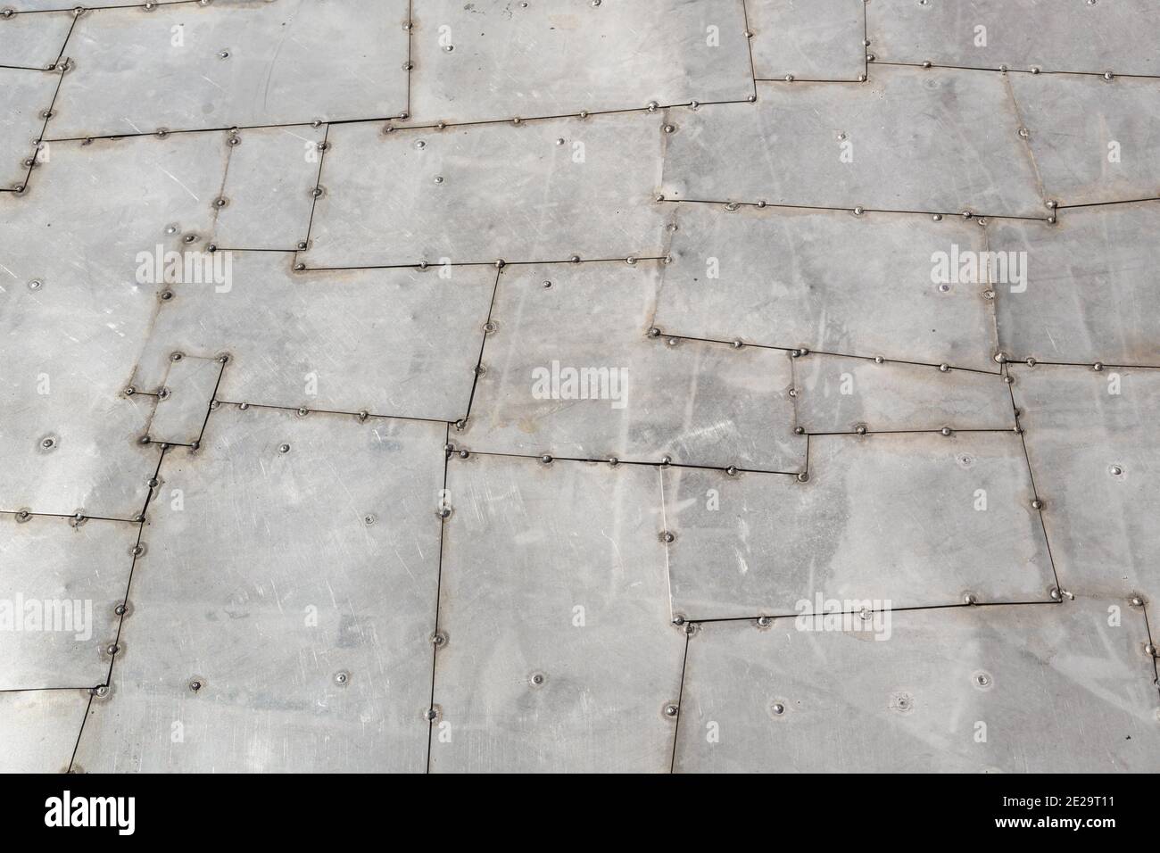 Aluminum aircraft skin. Riveted metal background. High resolution image