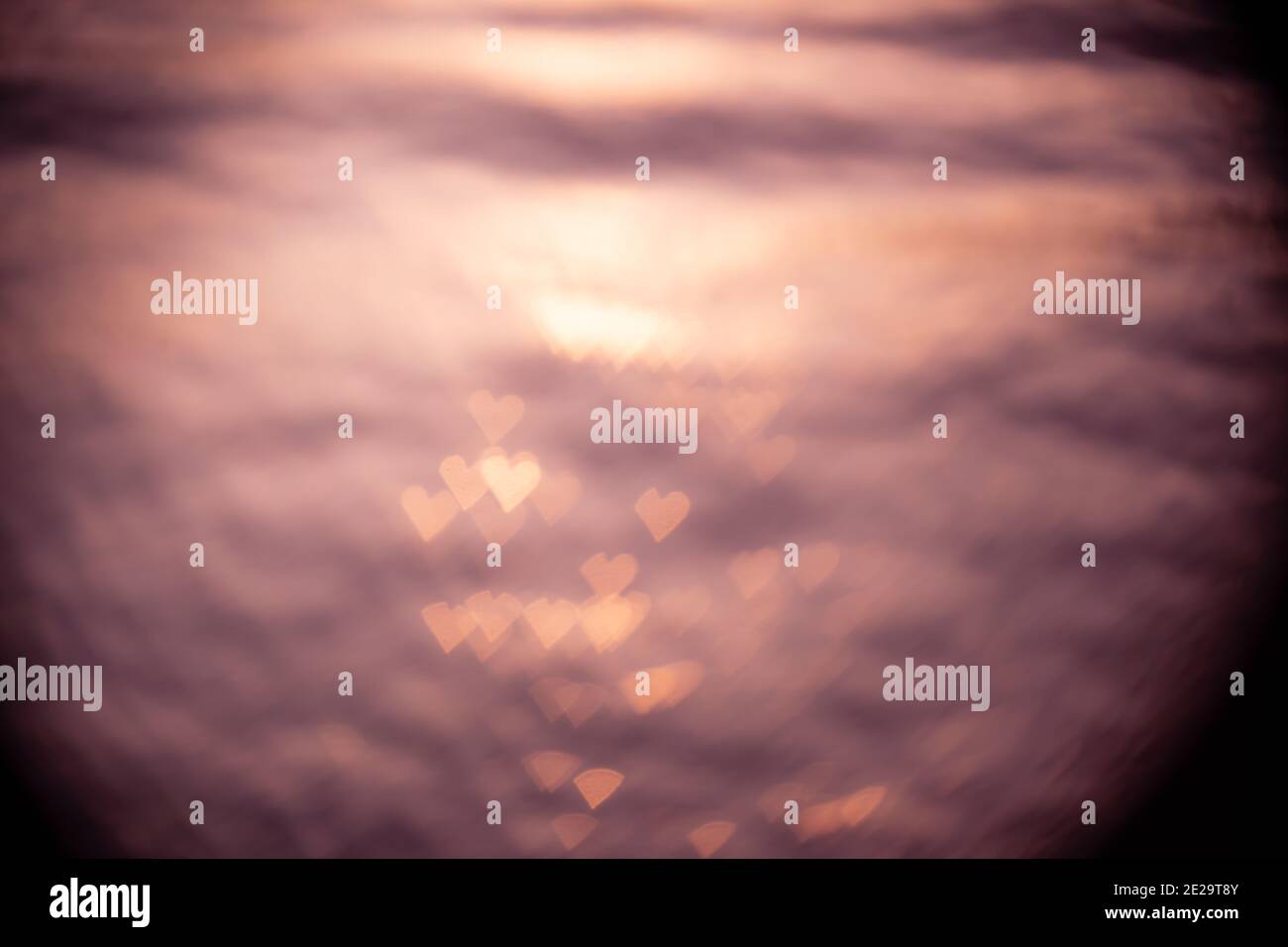 Abstract pink heart bokeh background Stock Photo