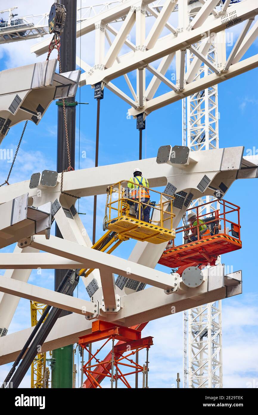 Workers on a construction site. Engineering and architectural ...