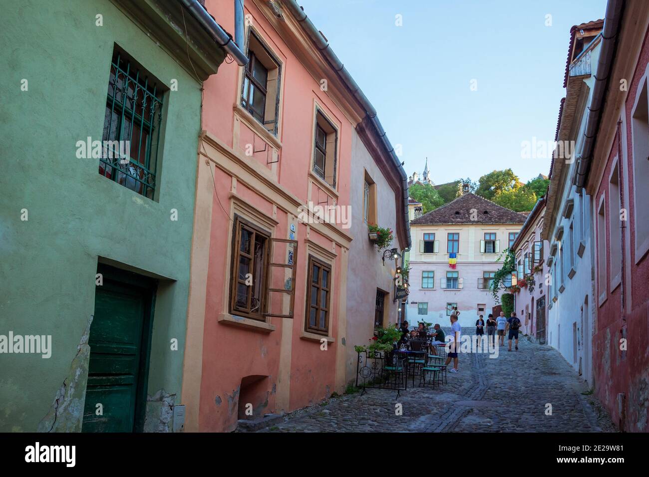 Beautiful colorful street in Sighisoara in typical traditional style Stock Photo