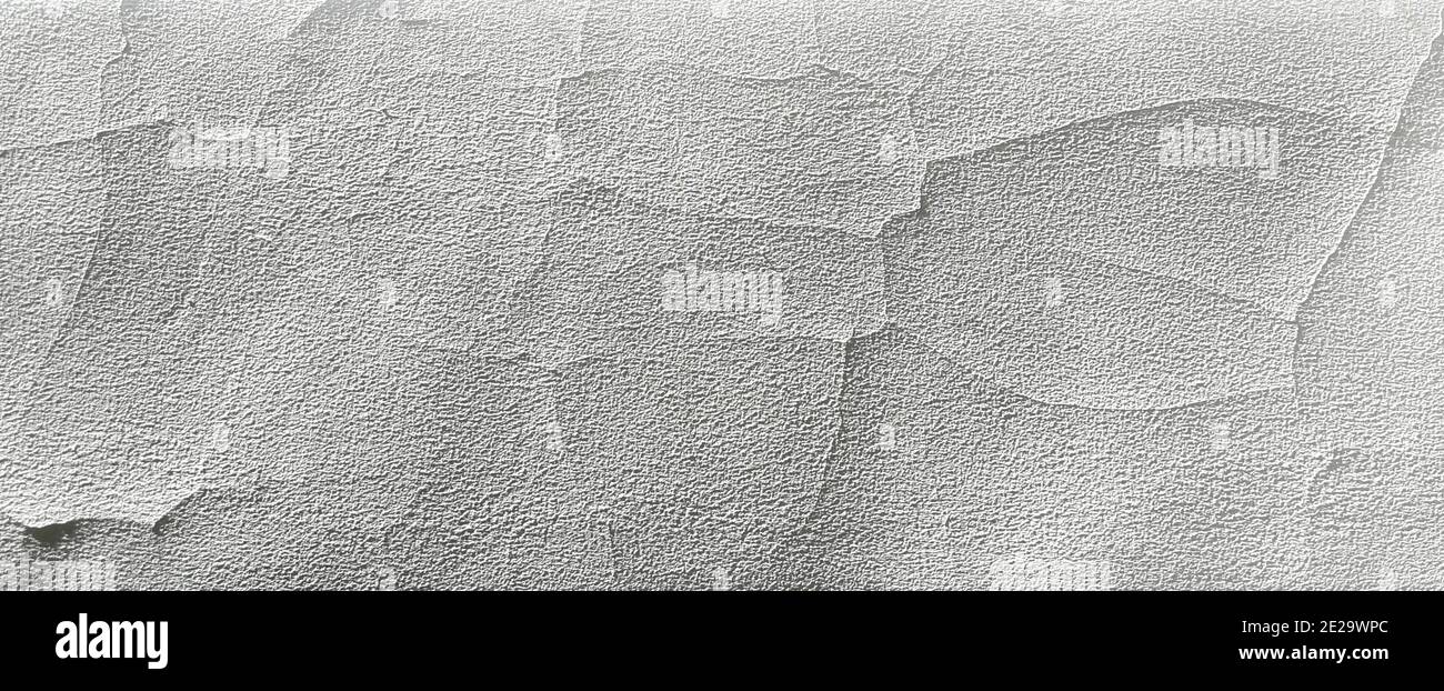 Cracking and peeling white paint on old rough wall texture abstract background banner Stock Photo