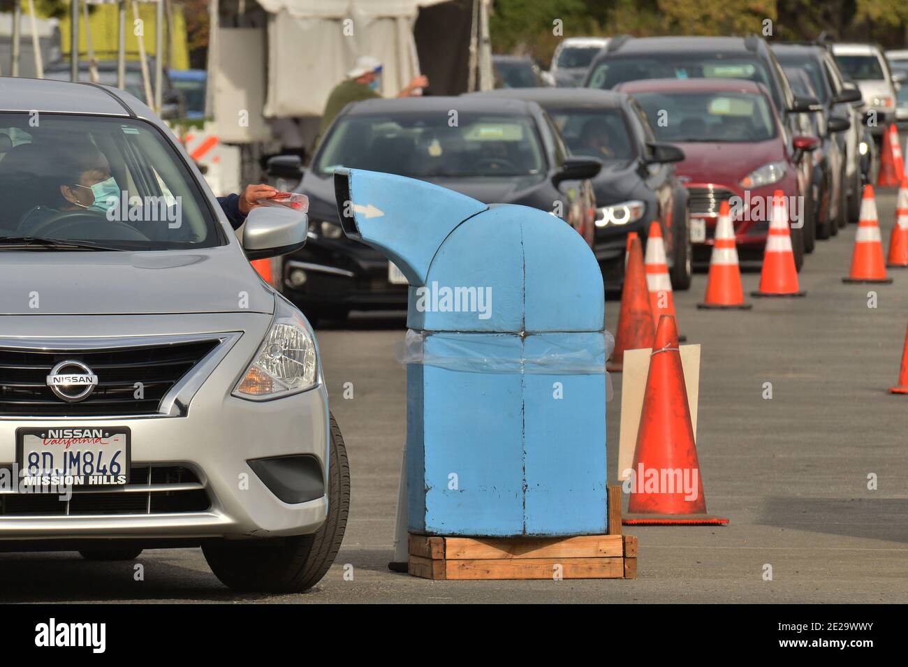 Los Angeles, California, USA. 13th Jan, 2021. Los Angeles, United States. 13th Jan, 2021. Residents deposit their Curative coronavirus test in a receptacle at the Hansen Dam testing site in Los Angeles on Tuesday, January 12, 2021. Los Angeles County health officials said Sunday they will stop providing the commonly used coronavirus test after federal regulators raised questions about its accuracy, saying the test made by Curative carries a "risk of false results, particularly false negative results." Photo by Jim Ruymen/UPI Credit: UPI/Alamy Live News Credit: UPI/Alamy Live News Stock Photo