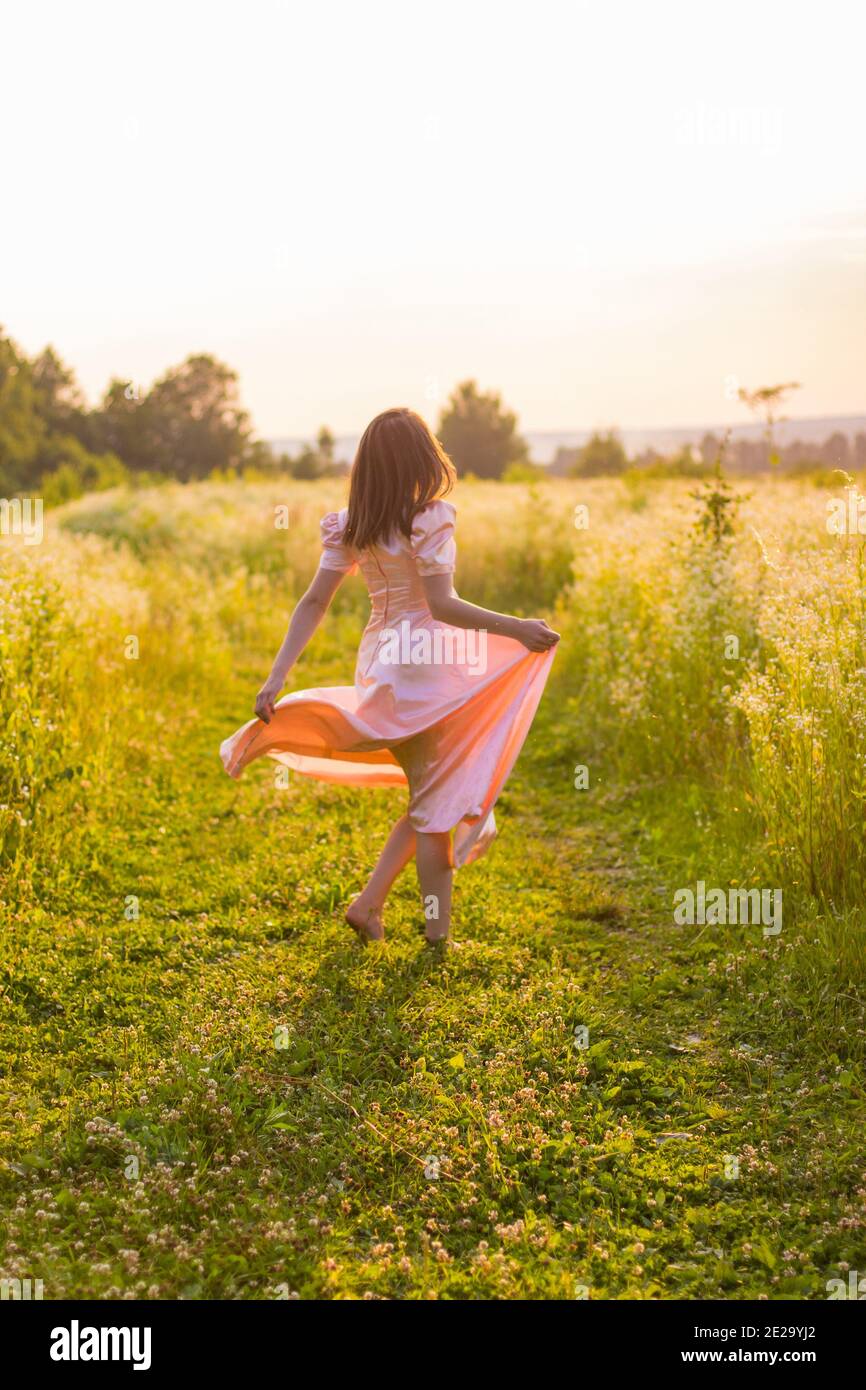 Run across grass hires stock photography and images Alamy