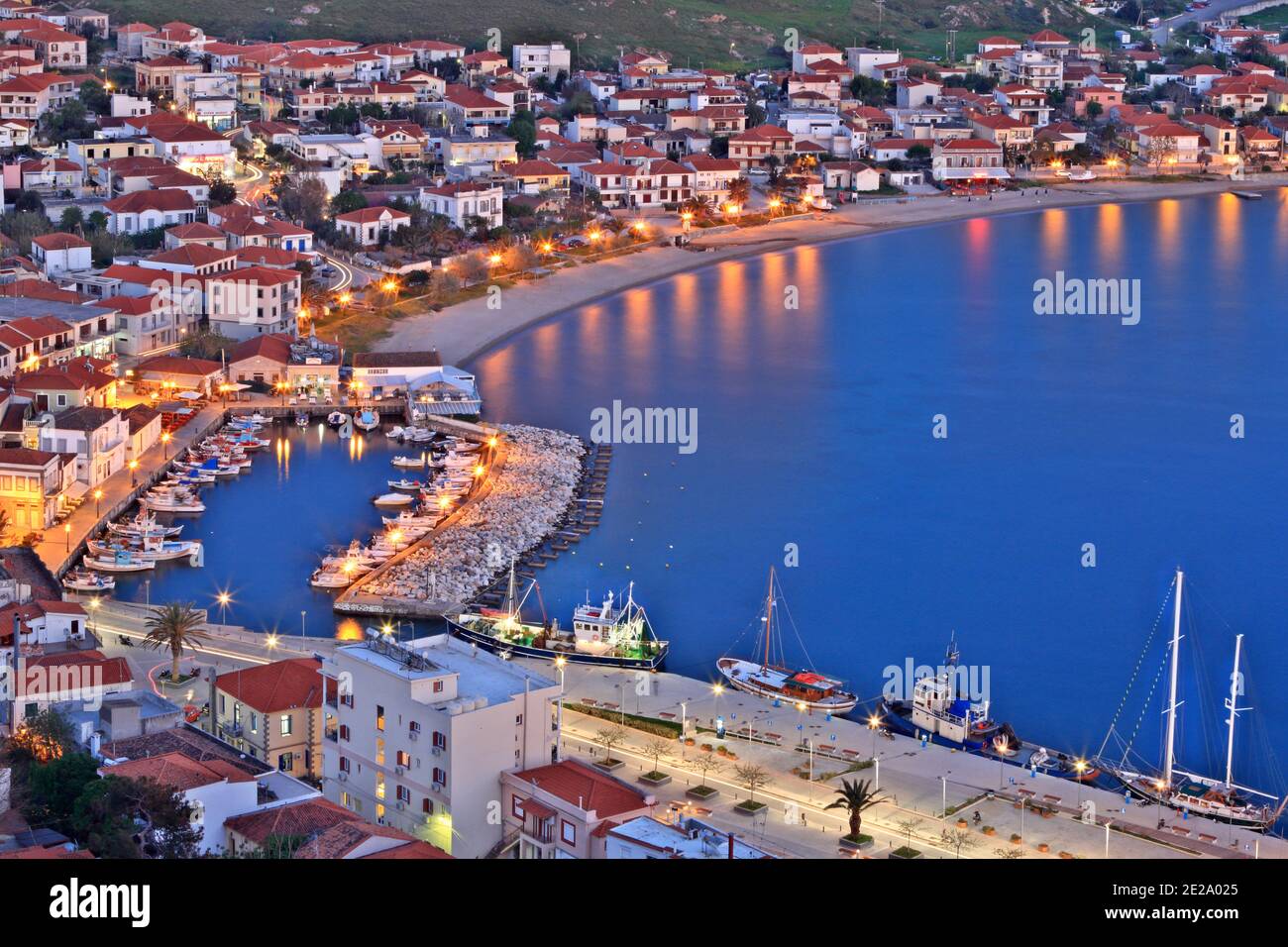 Myrina town, the capital town of Lemnos island, as seen during blue hour from the town's castle, in Lemnos, Greece, Europe Stock Photo