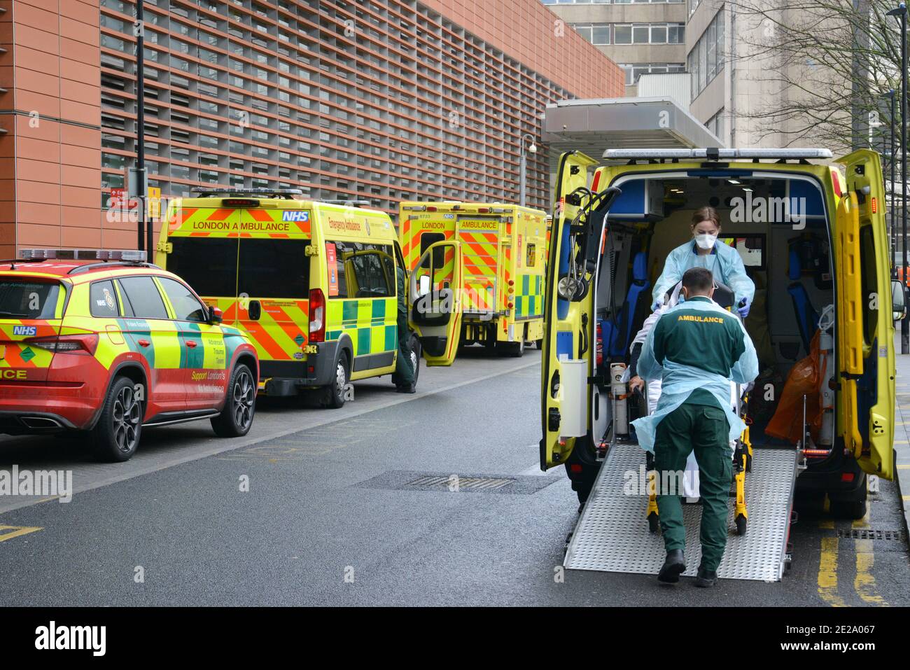 A patient is transported from an ambulance at theRoyal London Hospital in January 12th Stock Photo