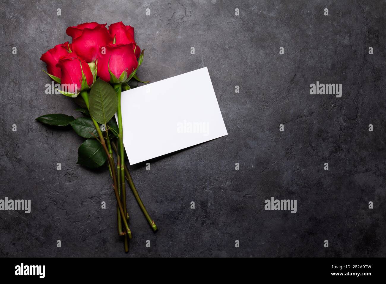 Valentines day greeting card with red rose flowers bouquet on stone ...
