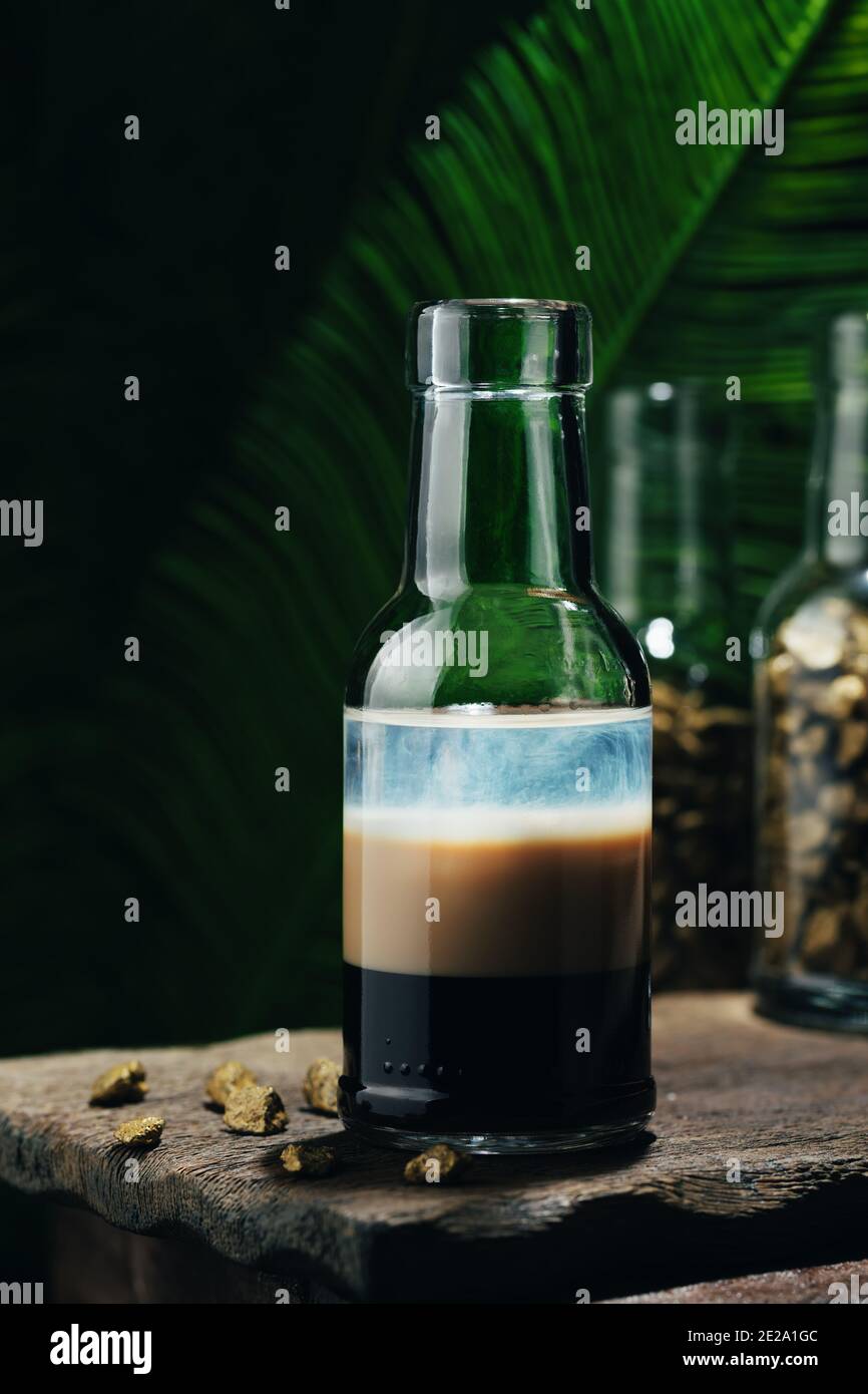 B52 layered cocktail with three liqueurs Kahlua, Baileys, Cointreau