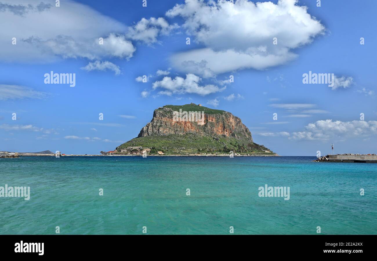 Monemvasia rock hill, a giant rock that is literally a peninsula in Peloponnese, Greece, where the medieval castle-town of Monemvasia is built. Stock Photo