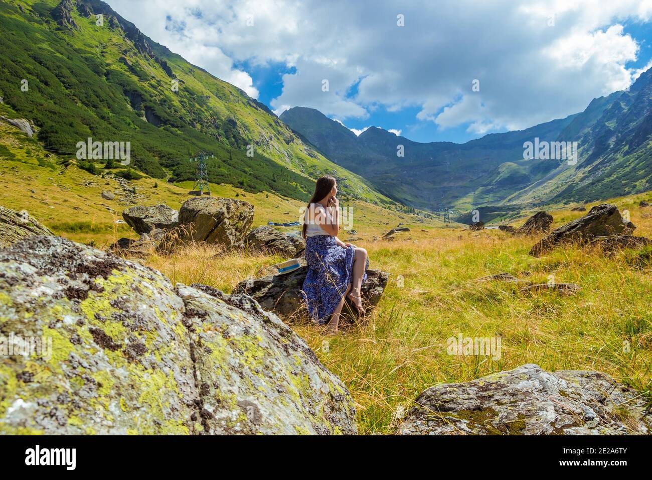 Beautiful girl sits in straw hi-res stock photography and images - Alamy