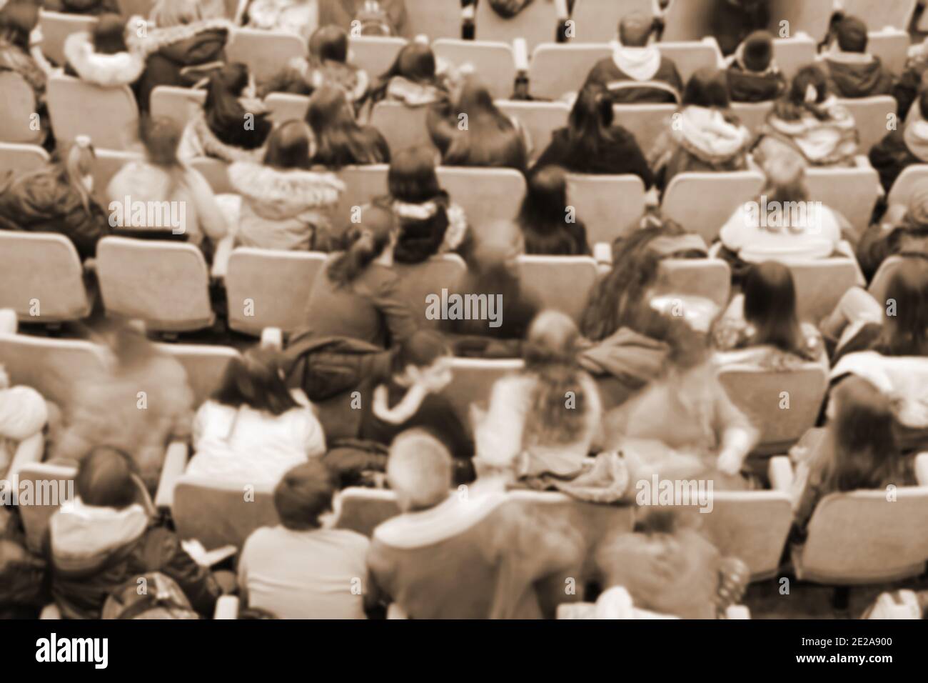 Audience in a theater, on a concert. Viewers watching the show. Stock Photo