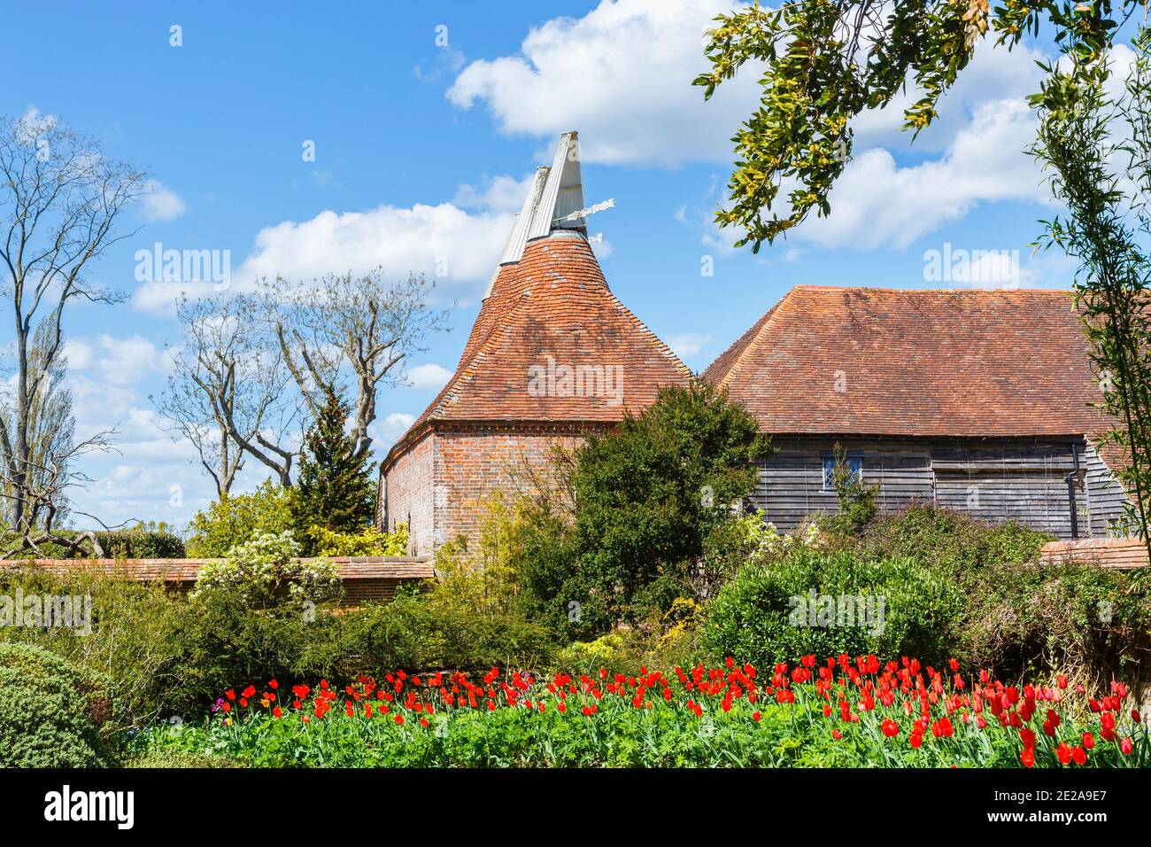 View of the oast houses by the Great Barn in Great Dixter, a country