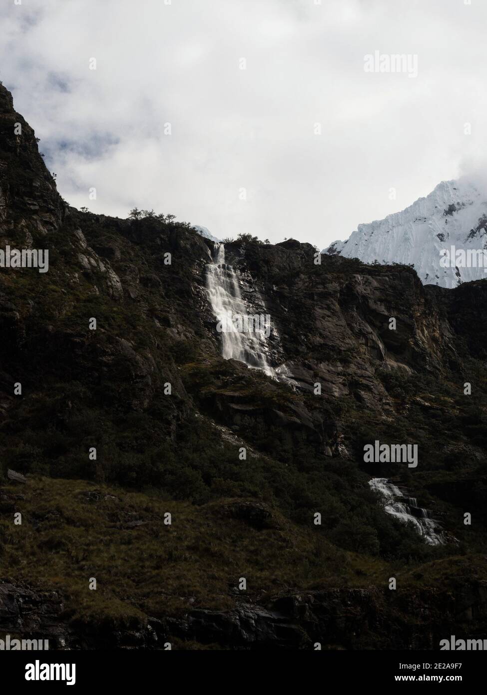 Panorama view of waterfall in andean mountain landscape valley near Laguna 69 Cordillera Blanca Cebollapampa Huaraz Ancash Peru South America Stock Photo