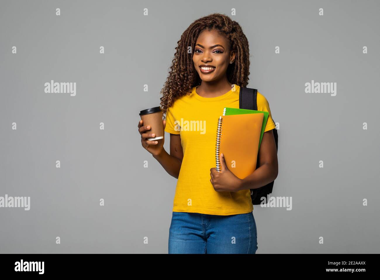 African American student girl holding books - Black people Stock Photo ...