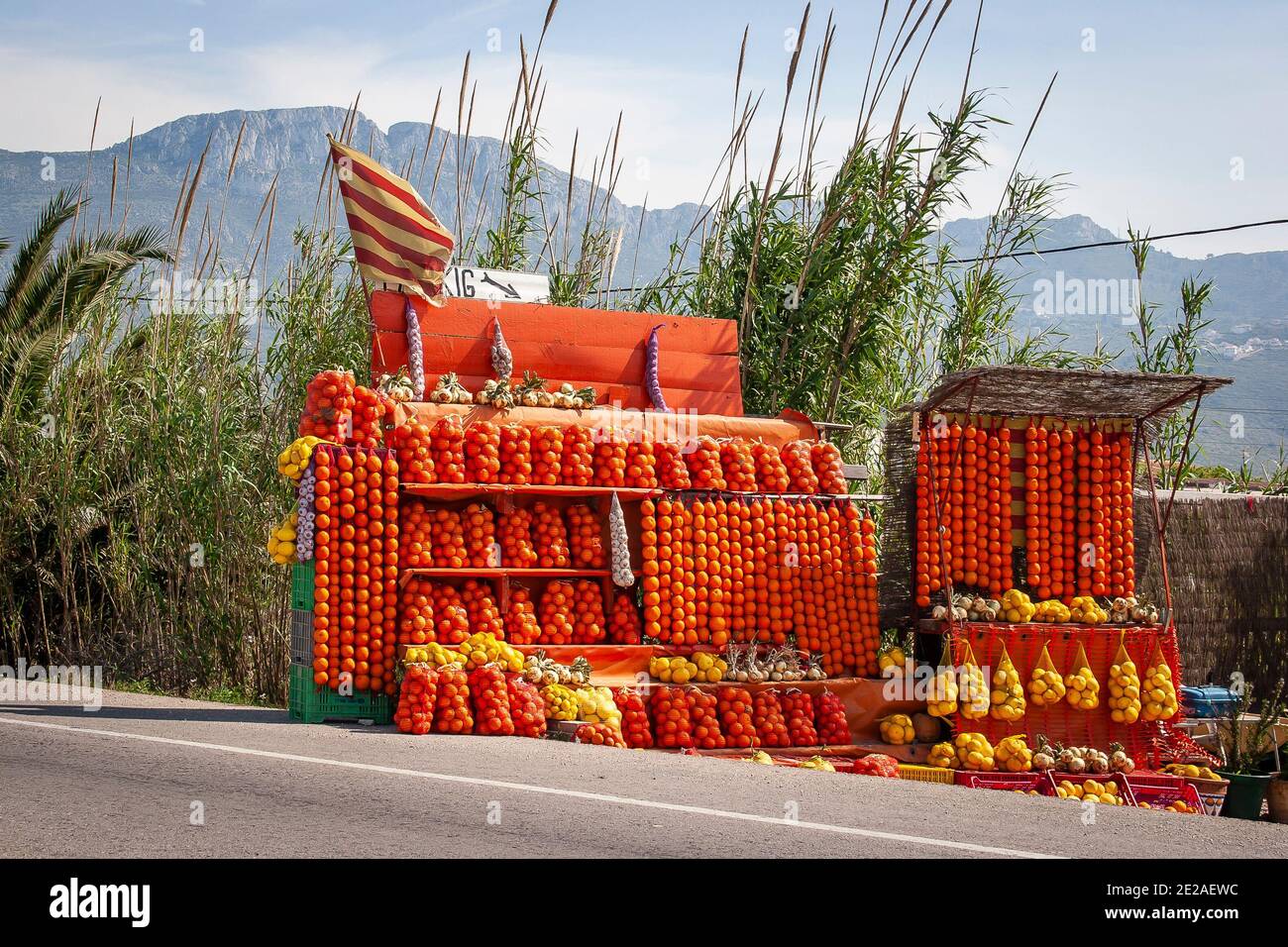 In season, local Valencian oranges for sale on a roadside fruit stall