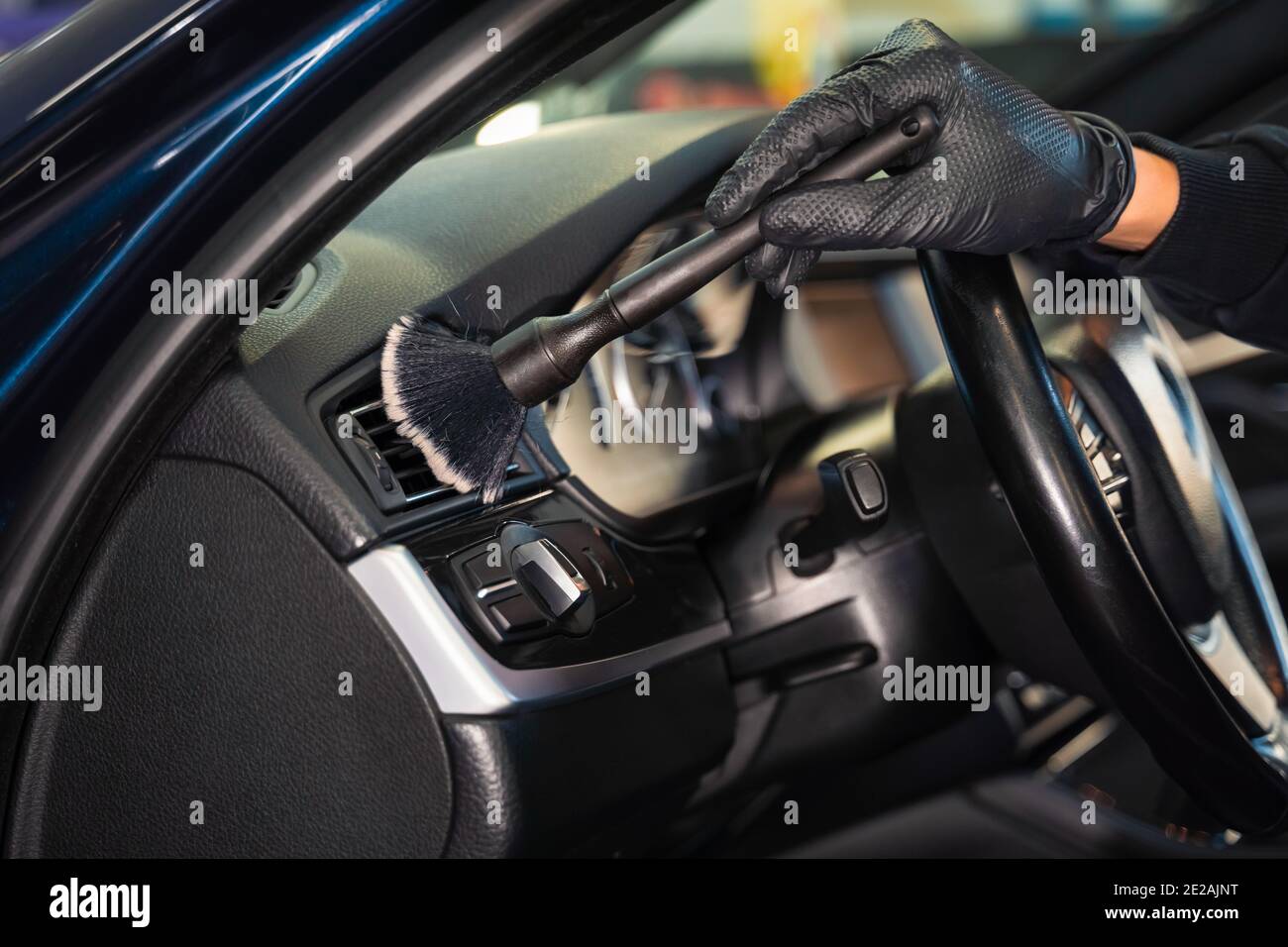 Cleaning car vents with brush. Auto detailing concept Stock Photo Alamy