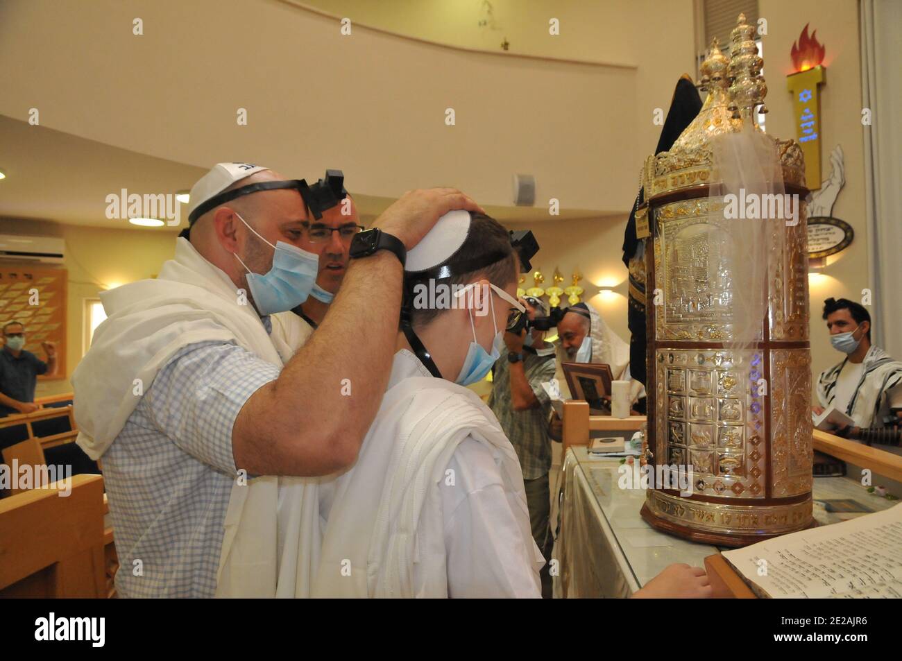Bar Mitzvah concept A Jewish boy of thirteen is performing the rites to ...