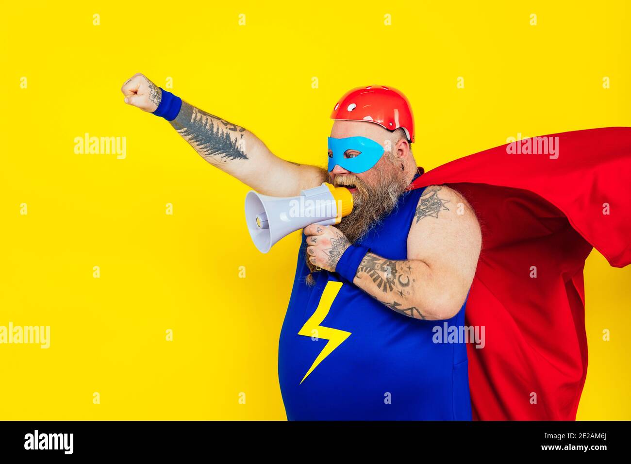Funny man wearing a superhero costume Stock Photo Alamy