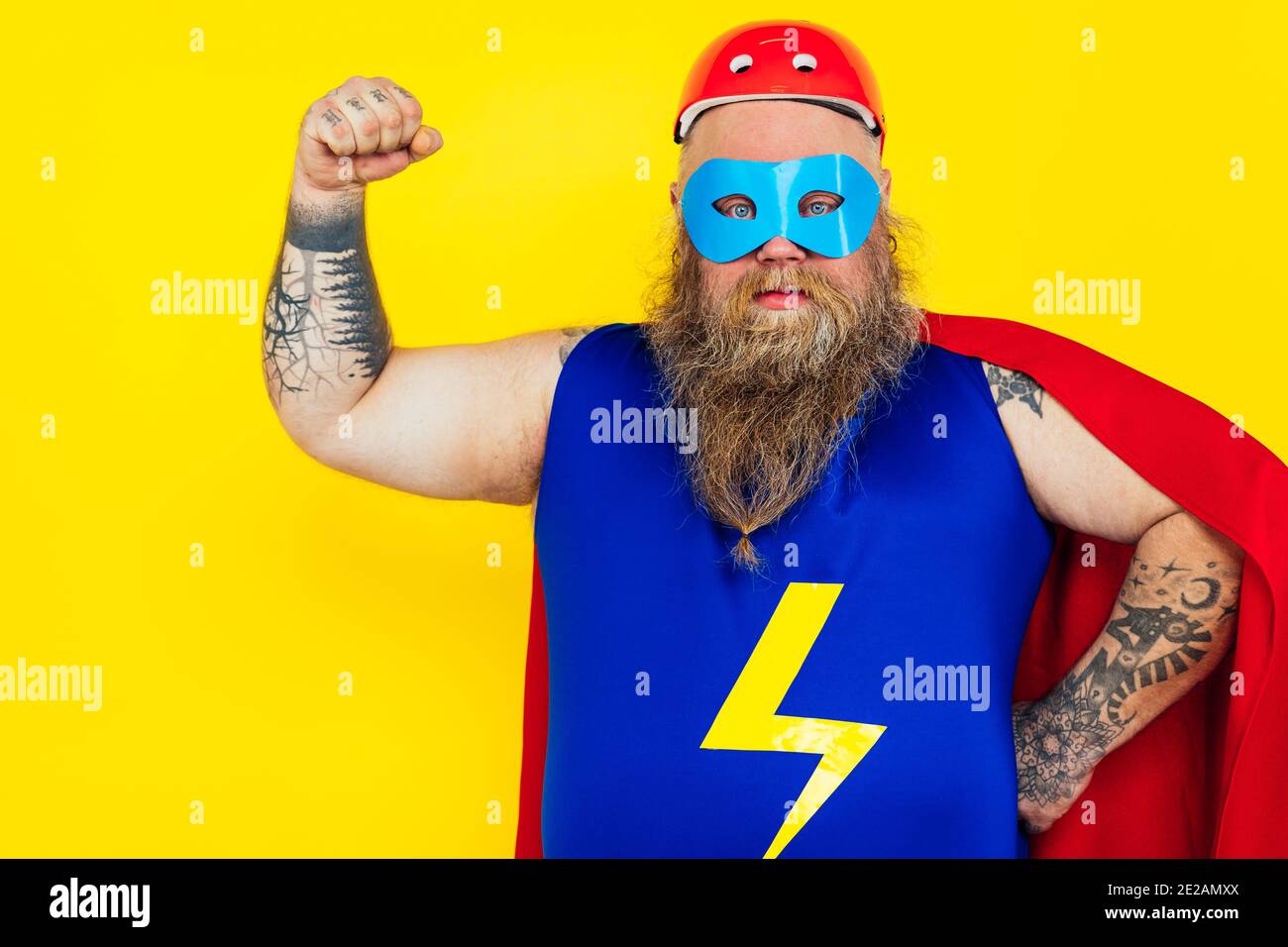 Funny man wearing a superhero costume Stock Photo Alamy