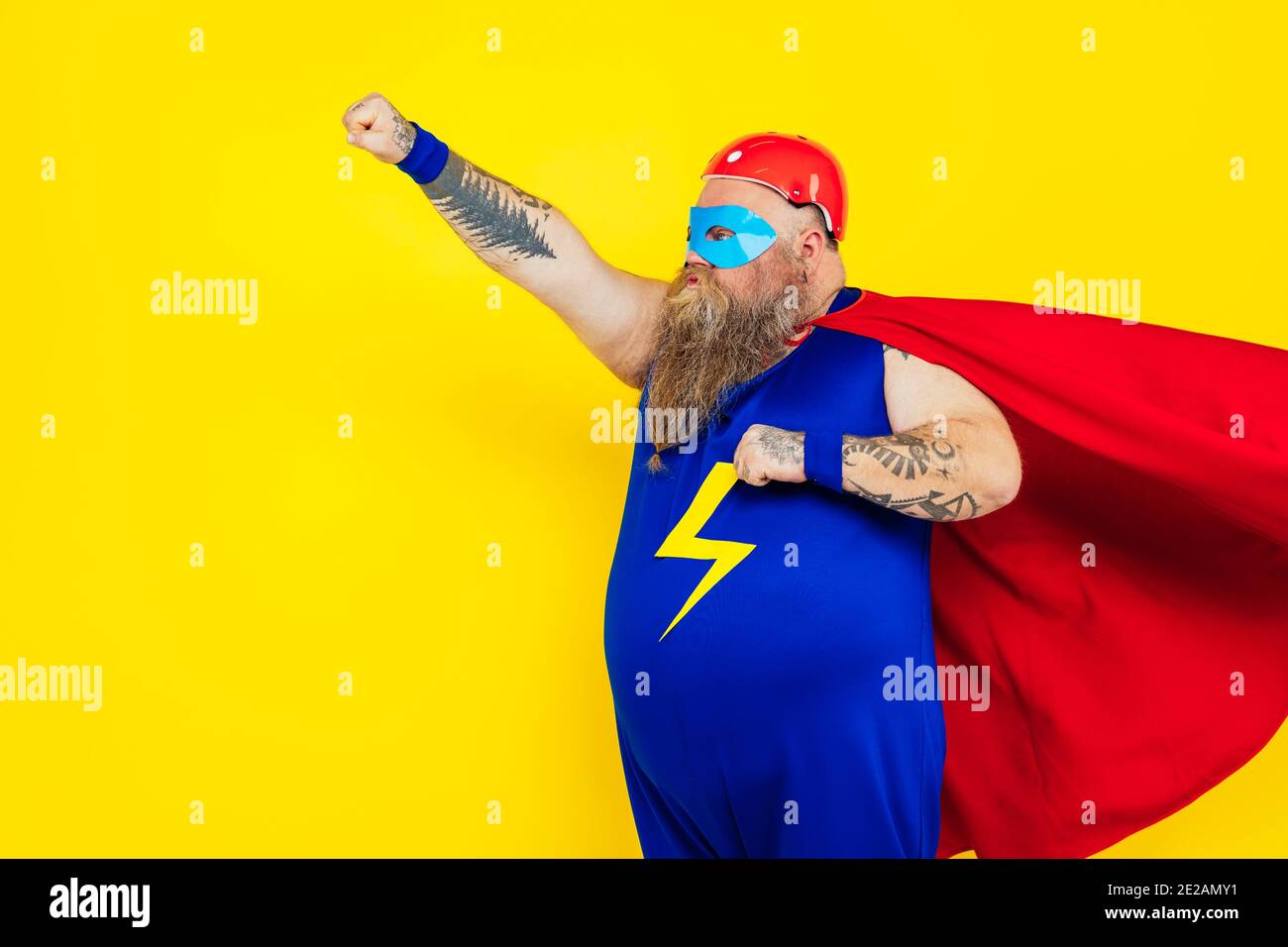 Funny man wearing a superhero costume Stock Photo Alamy