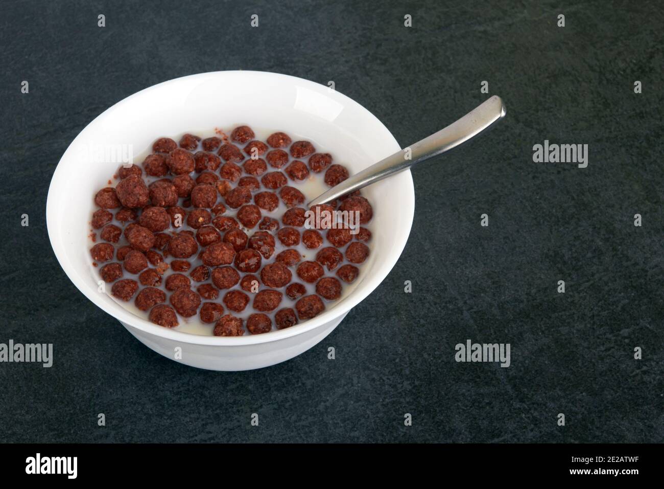 Chocolate cereal balls isolated on black background Stock Photo