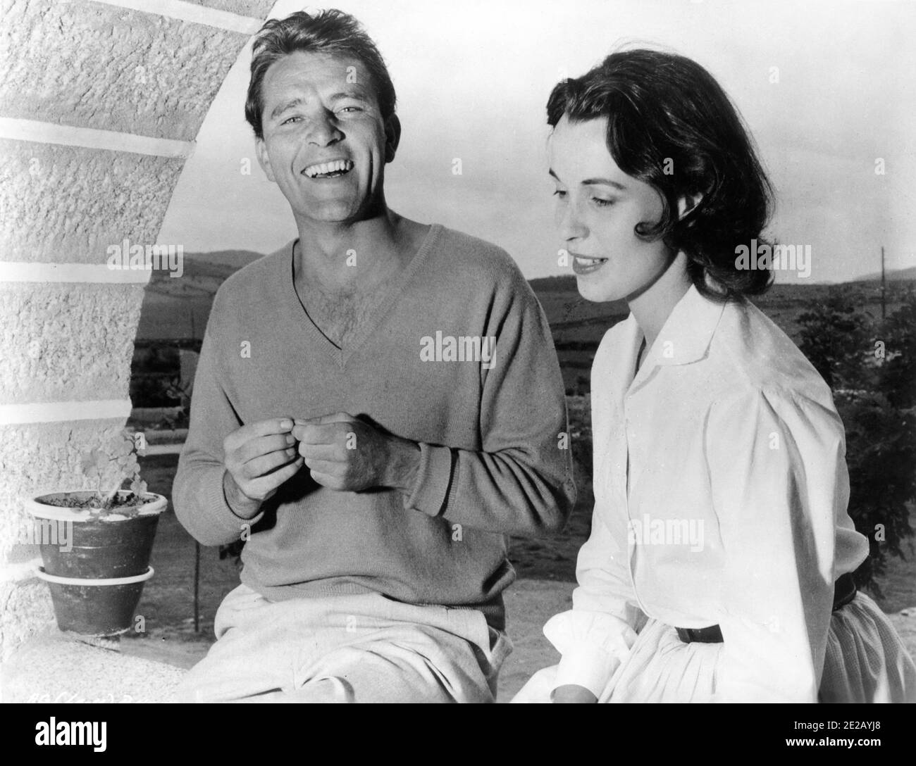 RICHARD BURTON and CLAIRE BLOOM candid in Spain in 1955 for filming of ALEXANDER THE GREAT released 1956 director / writer ROBERT ROSSEN publicity for United Artists Stock Photo