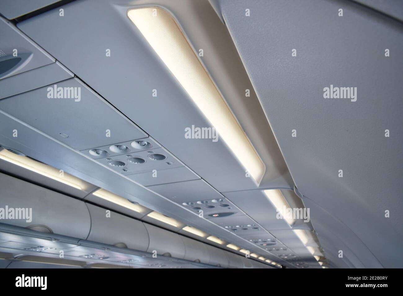 roof top and lamp in cabin on commercial plane Stock Photo