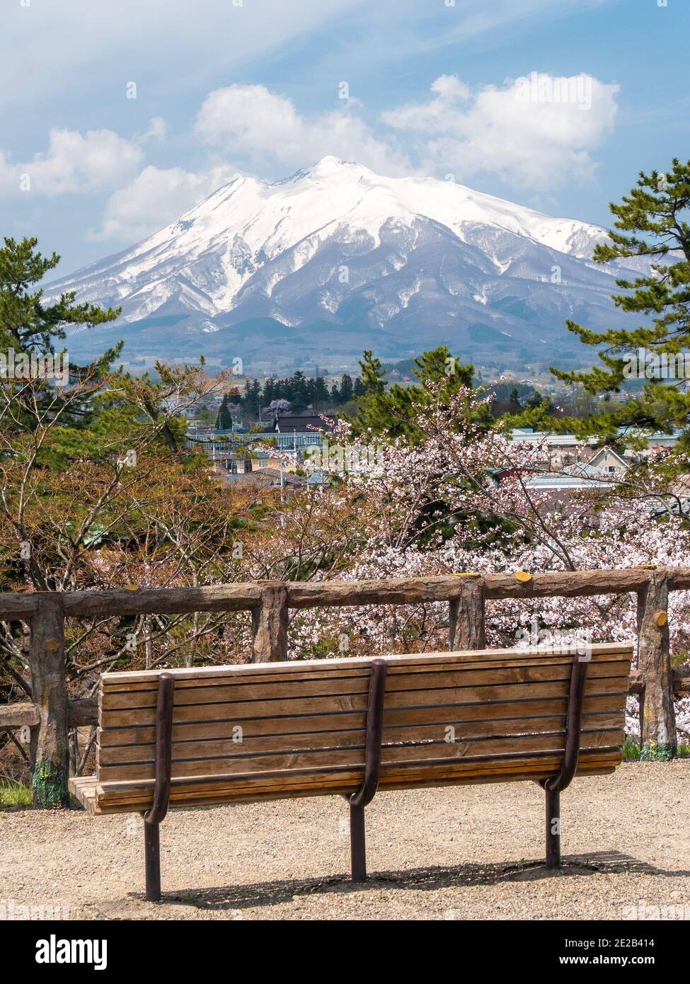 Landscape of mountain Fuji with view of city and benches at foreground Stock Photo