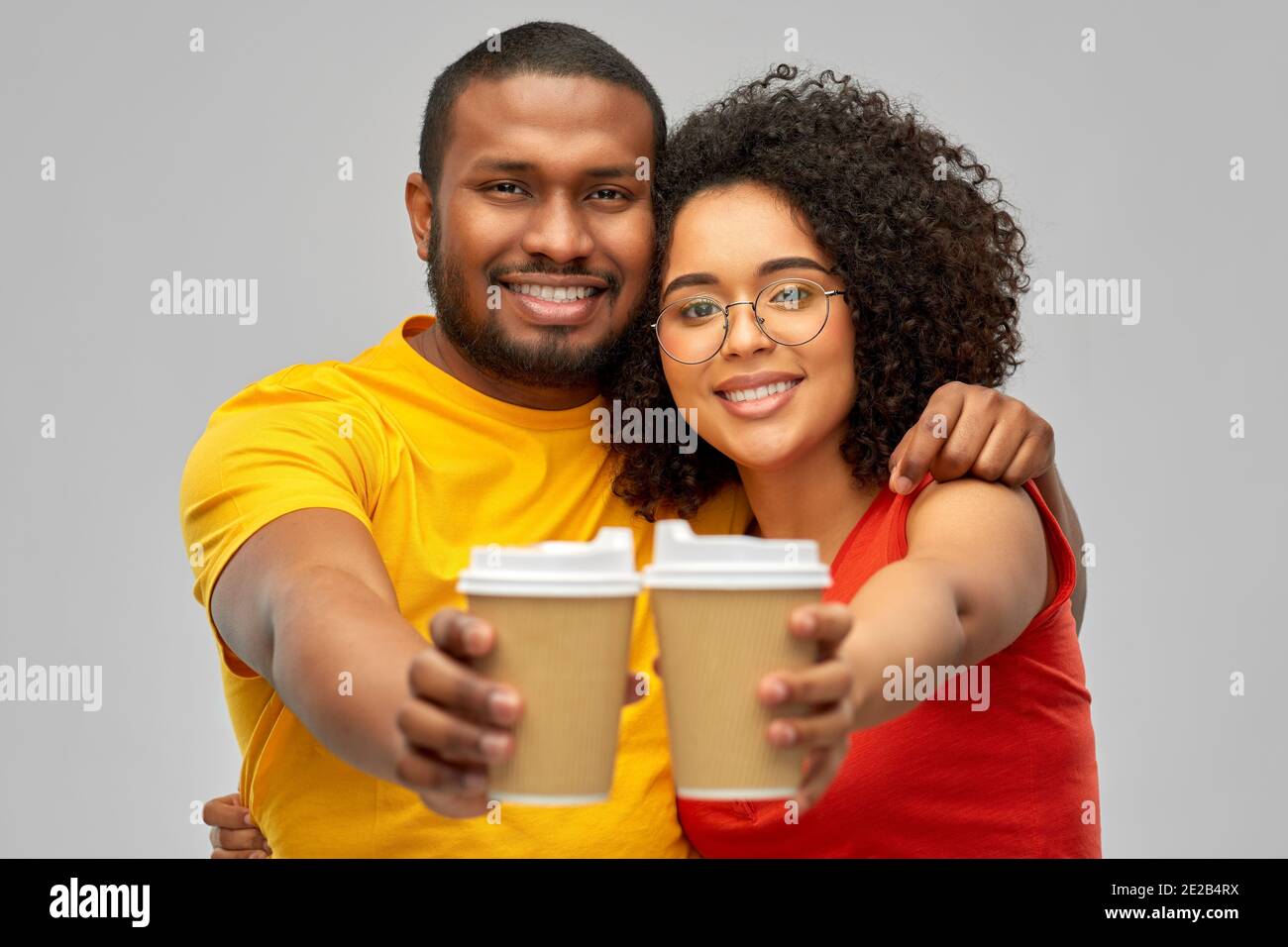 happy african american couple with coffee cups Stock Photo - Alamy