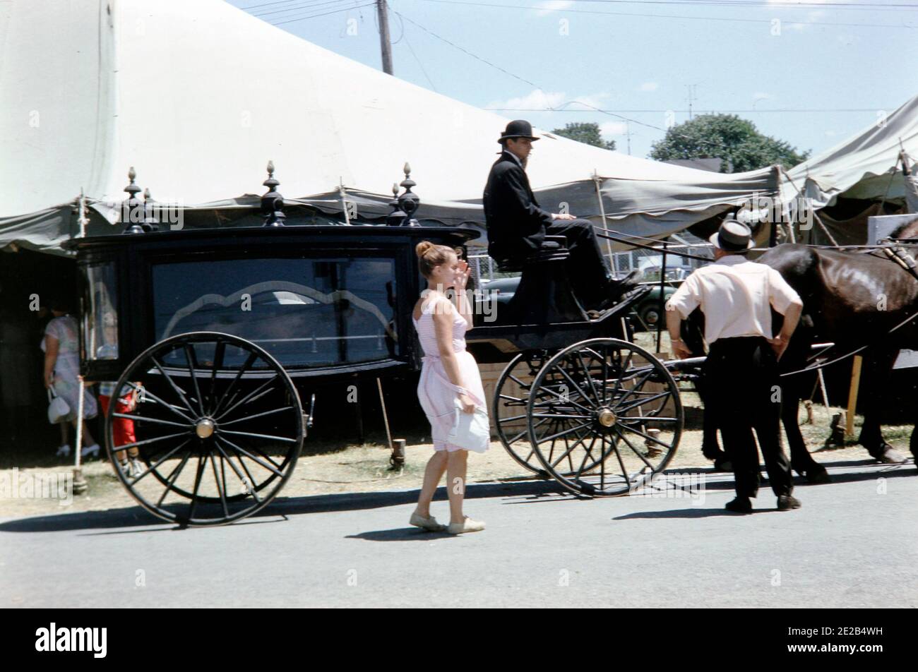A demonstration of a horse drawn hearse at a Pennsylvania Dutch Festival in 1963 Stock Photo