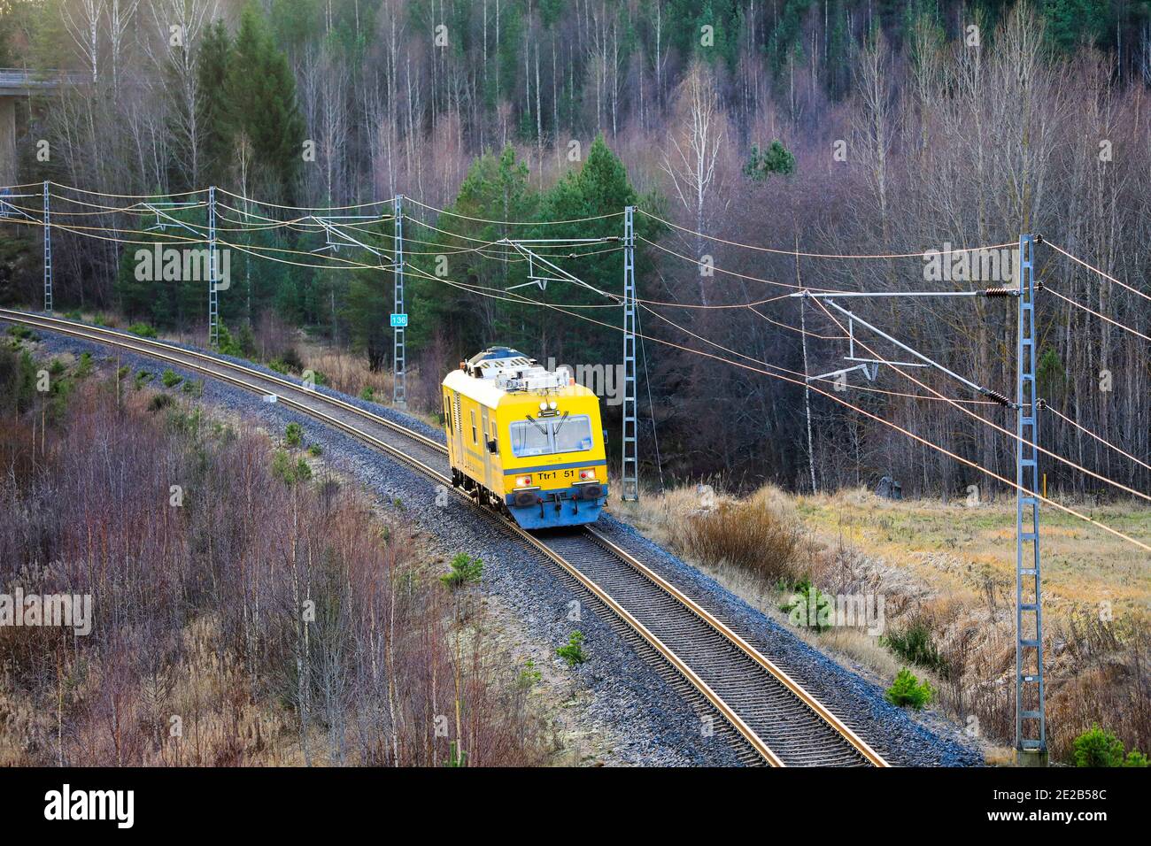 Finnish State Railways Ttr1 51 EMMA, Plasser & Theurer EM-120, track inspection vehicle at speed on Coastal Railway. Salo, Finland. November 27, 2020. Stock Photo