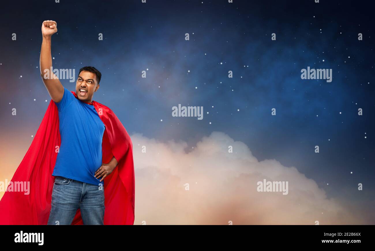 indian man in superhero cape over night sky Stock Photo - Alamy