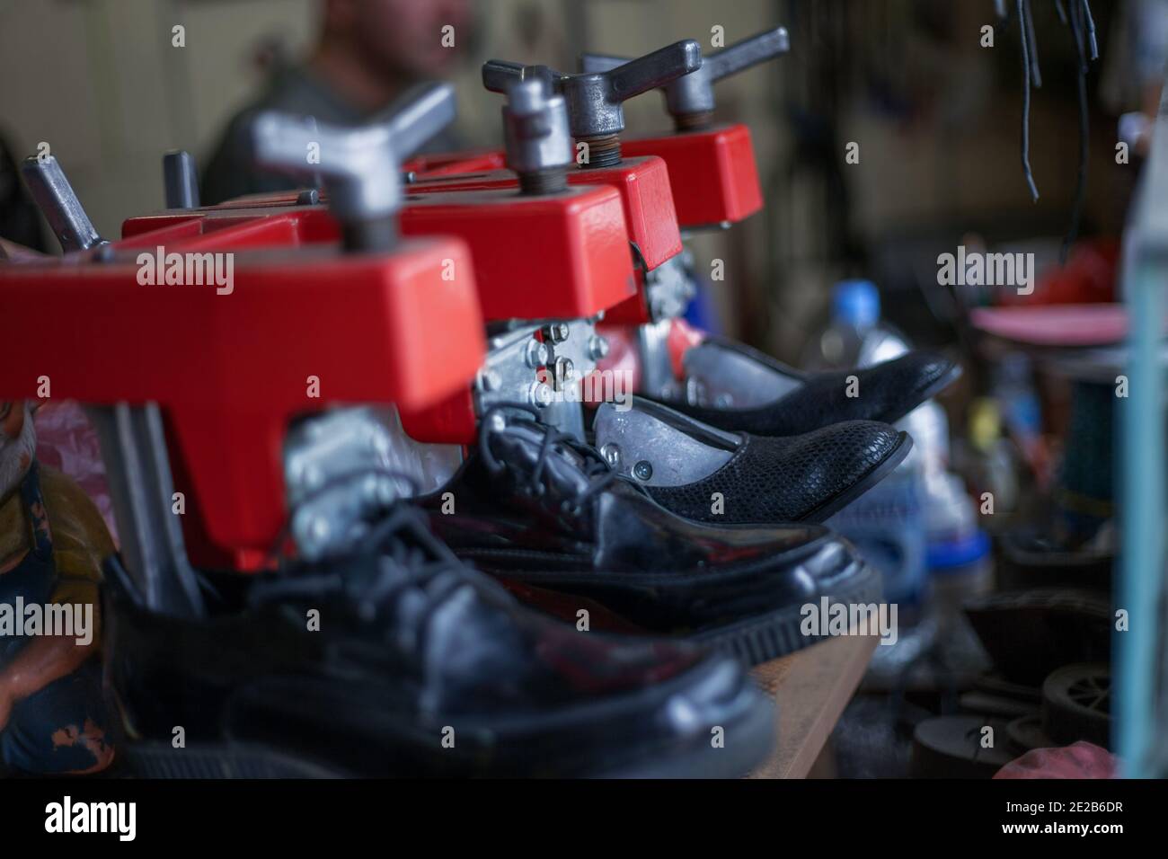 Closeup shot of new shiny shoes at a shoemakers shop Stock Photo