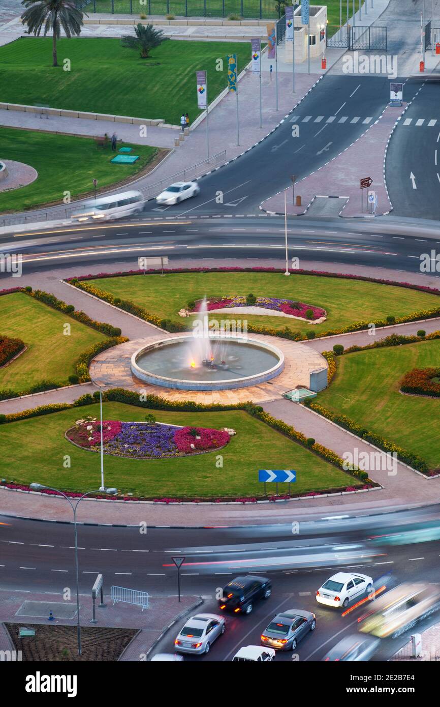Qatar, Doha, Traffic at roundabout infont of the Museum of Islamic Art
