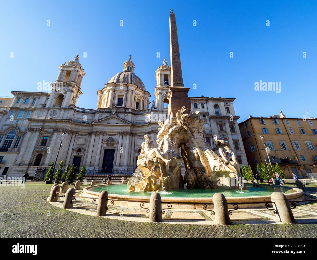 Sant'Agnese in Agone church and Fontana dei Quattro Fiumi in Piazza Navona - Rome, Italy Stock Photo