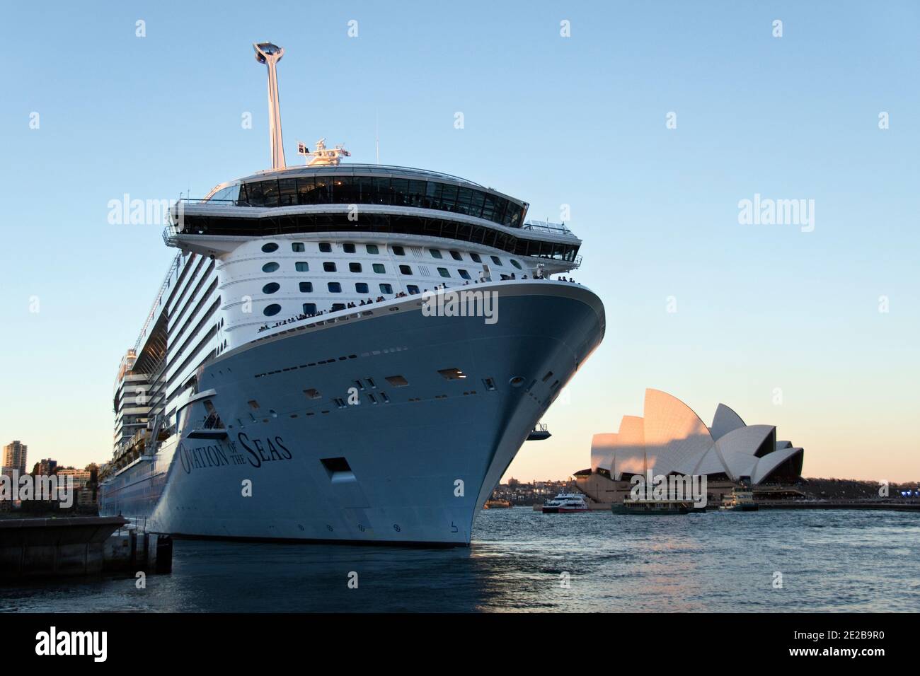 A Cruise Ship Departs Port In Rain As Viewed Through A Rain Splashed Window On A Container Ship Stock Photo Alamy